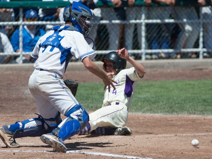 (Rick Egan  |  The Salt Lake Tribune)  Riverton runner Cayden Curtis slides safely into home as Bingham's Camden Snarr, bobbles the throw, in 6A state baseball championship action between Riverton and Bingham, at UVU in Orem, Friday, May 25, 2018.