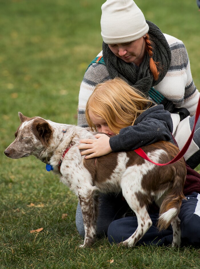 (Leah Hogsten  |  The Salt Lake Tribune) Shannon Boomgarden, son Folsom, 7, and their newly rescued dog Georgie during the 2017 Strut Your Mutt dog walk and fundraiser to save the lives of homeless pets, October 14, 2017  at Liberty Park. Participants can choose to raise money for Best Friends or for one of hundreds of participating shelters, rescue groups and other animal welfare groups. 