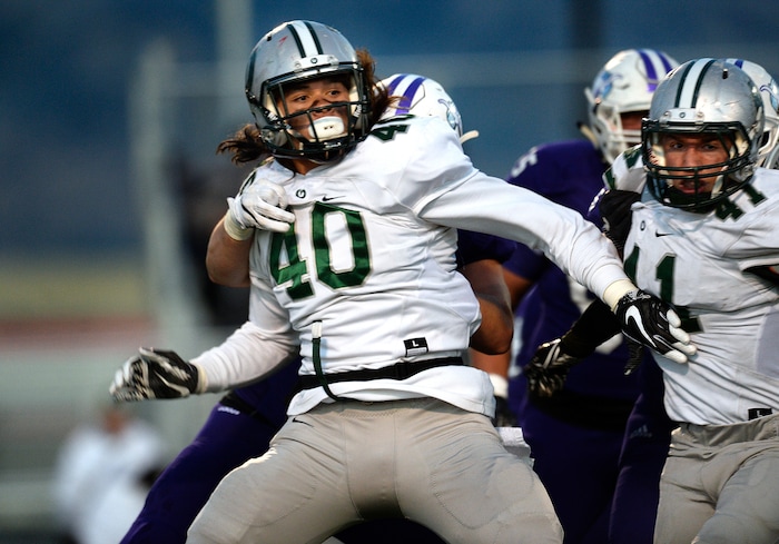 (Scott Sommerdorf   |  The Salt Lake Tribune)   Olympus DE Cameron Latu during first half play. Lehi led Olympus 26-0 late in the second half, Friday, September 22, 2017.