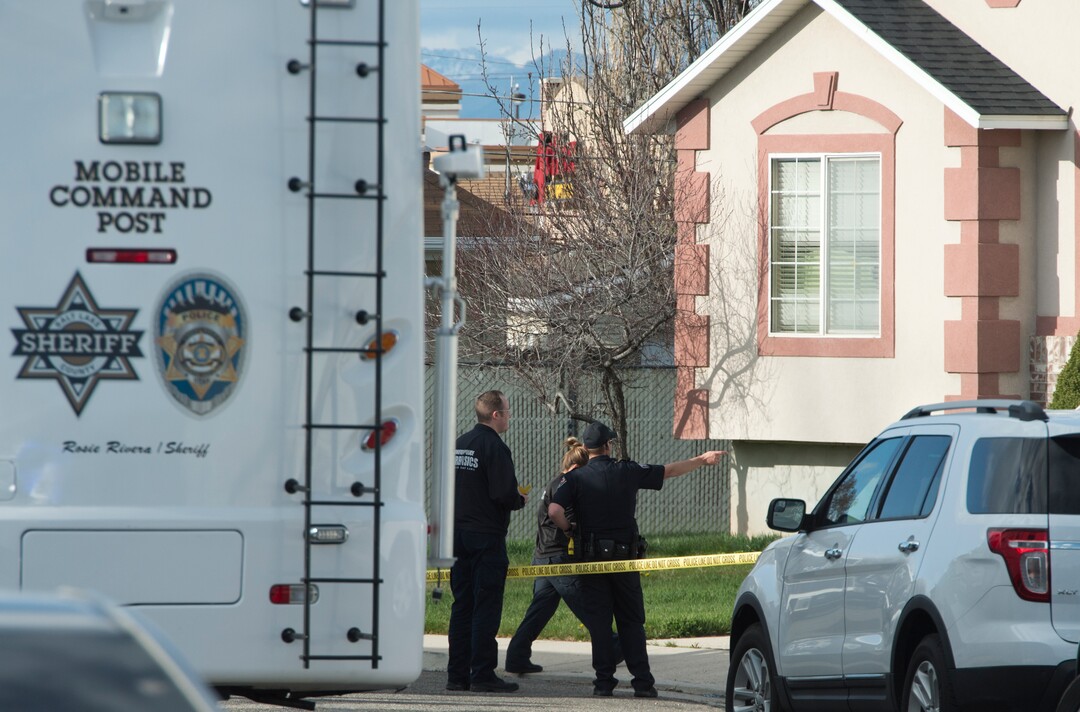 (Rick Egan  |  The Salt Lake Tribune)     Investigators from West Valley and Unified Police investigate an officer involved  shooting, leaving the suspect dead, in West Valley City, Sunday, April 8, 2018.