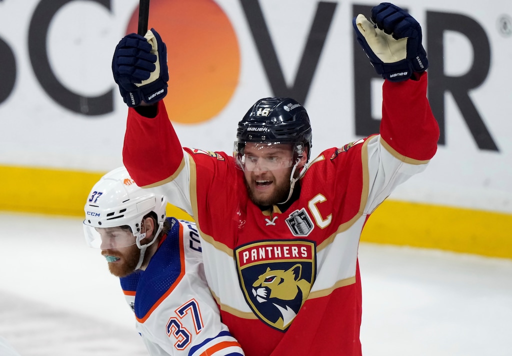 (Nathan Denette | The Canadian Press via AP) Florida Panthers forward Aleksander Barkov (16) celebrates after his team's second goal as Edmonton Oilers forward Warren Foegele (37) reacts the during the second period of Game 7 of the NHL hockey Stanley Cup Final in Sunrise, Fla.,  Monday, June 24, 2024.