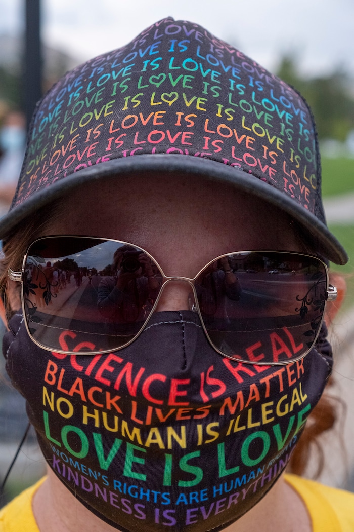 (Leah Hogsten | The Salt Lake Tribune) Wendy Garvin with the Summoned group keeps a protective watch over the crowd. Black Lives Matter supporters and Salt Lake Equal Rights Movement members march from the Capitol to Washington Square on Monday, August 31, 2020 calling for justice for Jacob Blake who was shot in the back by police in Kenosha, Wisconsin on August 23rd.