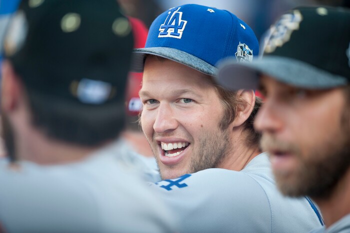 Los Angeles Dodgers' Clayton Kershaw laughs with teammates during the 2016 MLB All-Star Game at Petco Park in San Diego, Tuesday, July 12, 2016. (Kevin Sullivan/The Orange County Register via AP)