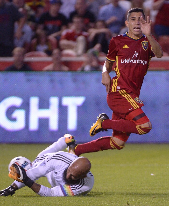 (Leah Hogsten  |  The Salt Lake Tribune) Real Salt Lake forward Jefferson Savarino flies over Colorado Rapids goalkeeper Tim Howard (1) in the first half.   Real Salt Lake are 1-0 at the half against the Colorado Rapids for the Rocky Mountain Cup at Rio Tinto Stadium, Saturday, August 26, 2017. 