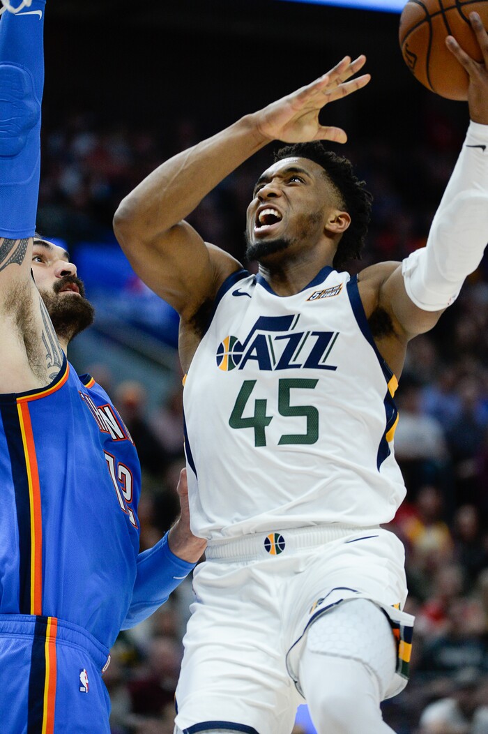 (Francisco Kjolseth  |  The Salt Lake Tribune)  Utah Jazz guard Donovan Mitchell (45) pushes through the defense as the Utah Jazz host the Oklahoma City Thunder in their NBA basketball game at Vivint Smart Home Arena in Salt Lake City on Mon. Dec. 9, 2019.