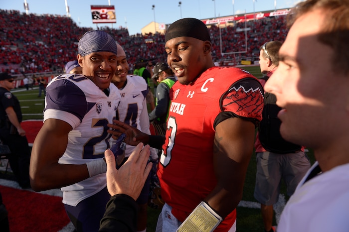 Leah Hogsten  |  The Salt Lake Tribune
Utah Utes quarterback Troy Williams (3) catches up with his old teammates. University of Washington Huskies defeated University of Utah Utes 31-24 at Rice-Eccles Stadium, Saturday, October 29, 2016.
