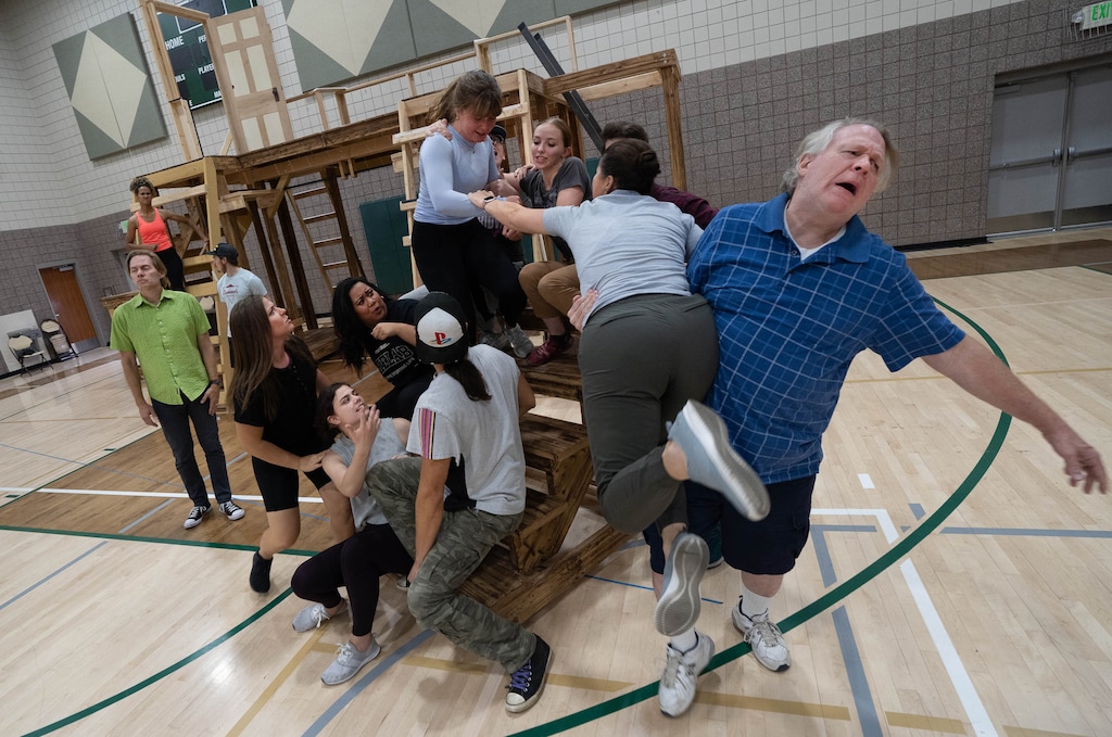 (Francisco Kjolseth | The Salt Lake Tribune) Actor David Weekes breaks up a fight amongst delegates as the cast of "1820: The Musical" runs through scenes during a recent rehearsal on Tuesday, July 13, 2021, in American Fork. George Nelson has spent the past several years writing and producing the show, which is about the Latter-day Saint prophet Joseph Smith and wife Emma Smith. Nelson created the musical as a response to "The Book of Mormon" musical.