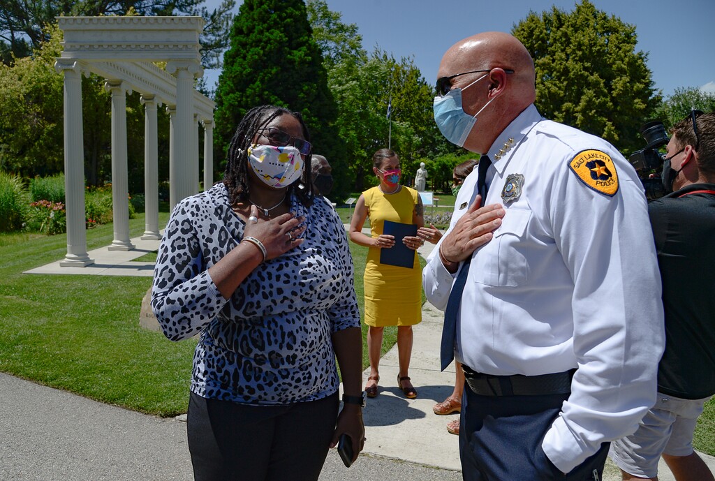 (Francisco Kjolseth | Tribune file photo) Author and activist Darlene McDonald, speaks with Salt Lake City Police Chief Mike Brown following a press event with Lake City Mayor Erin Mendenhall, the Salt Lake City Council, and members of the community who announced the Commission on Racial Equity in Policing, at the International Peace Gardens on, June 25, 2020. The commission is seeking public input on it's initial recommendations and has rescheduled a virtual meeting for Thursday, Jan. 28.