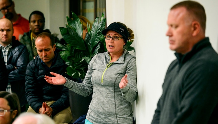 (Steve Griffin  |  The Salt Lake Tribune) Salt Lake City resident Kate Tipple asks Salt Lake City Mayor Jackie Biskupski and Salt Lake City Police Chief Mike Brown about Operation Rio Grande during the Liberty Wells Community Council meeting at the Tracy Aviary education room in Salt Lake City Wednesday November 8, 2017.