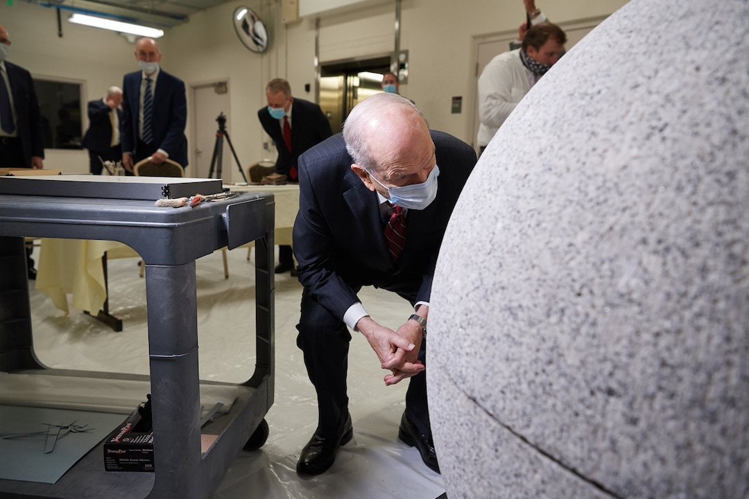 (photo courtesy The Church of Jesus Christ of Latter-day Saints) President Russell M. Nelson inspects the capstone of the Salt Lake Temple to the First Presidency on May 20, 2020.