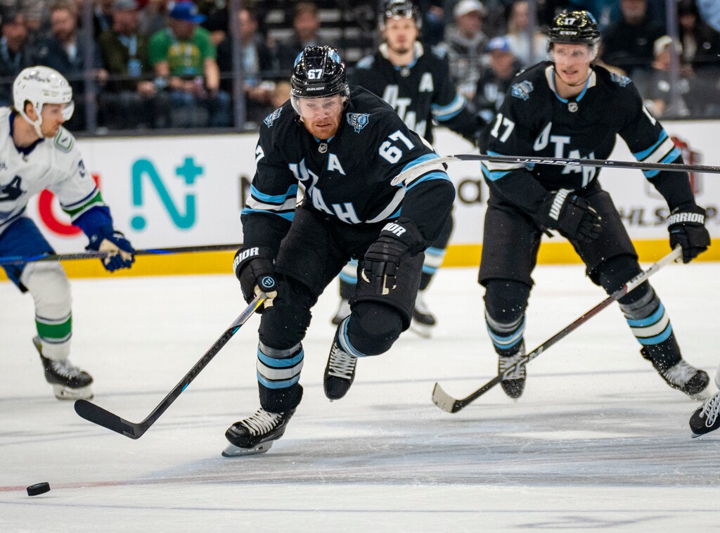 (Rick Egan | The Salt Lake Tribune)  Utah Hockey Club left wing Lawson Crouse (67) skates toward the puck, in NHL action between Utah Hockey Club and Vancouver Canucks at the Delta Center, on Wednesday, Dec 18, 2024.