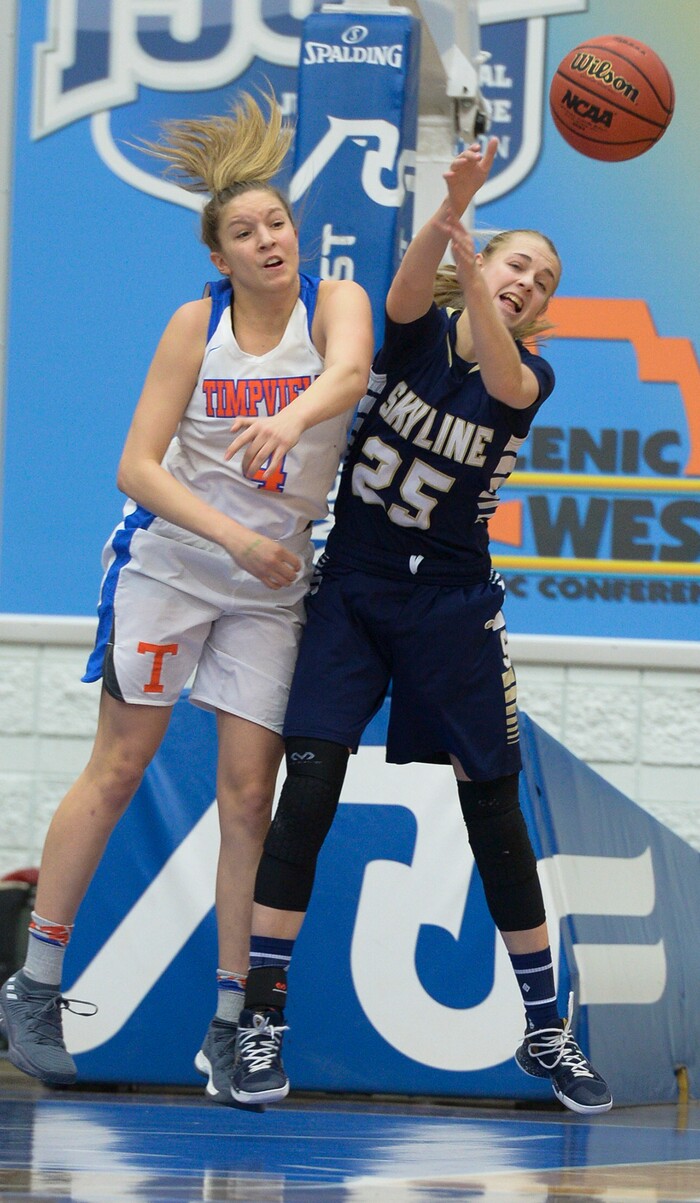 (Leah Hogsten  |  The Salt Lake Tribune) Timpview's Ella Pope (04) and Skyline's Madison Grange (25) fight for the rebound.  Timpview faces Skyline in their semifinal game of the 5A High School Girls' Basketball Tournament at SLCC in Taylorsville, Friday, Feb. 23, 2018. 