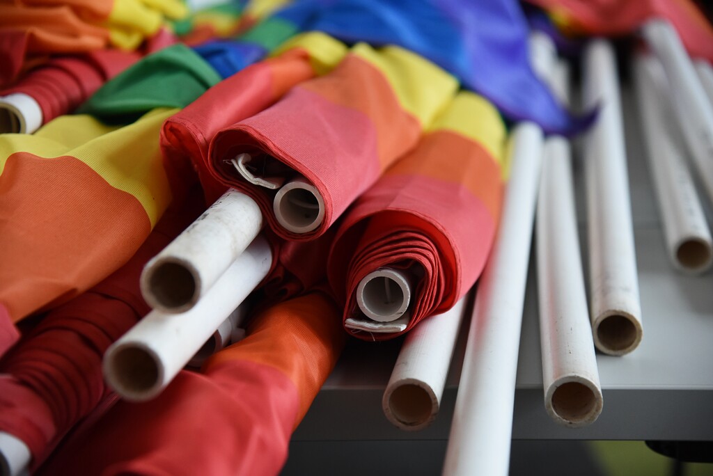 (Francisco Kjolseth | Tribune file photo)  Gay pride flags are recycled for a transgender project at the VOA Youth Resource Center.