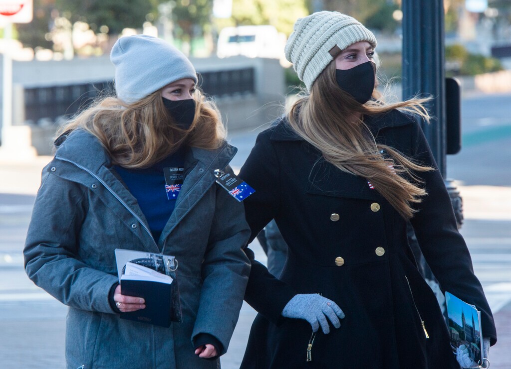 (Rick Egan  |  The Salt Lake Tribune)     Pedestrians downtown wear masks as they wait for the light to change on Main Street in Salt Lake City, Monday, Oct. 26, 2020.