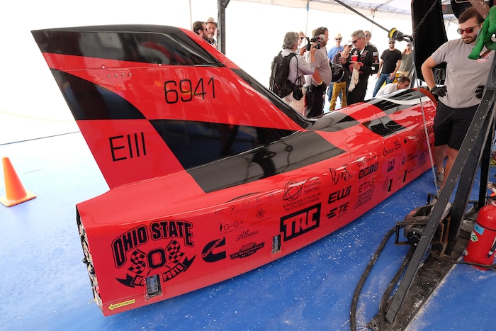 (Francisco Kjolseth  |  The Salt Lake Tribune)  The pit crew begins diagnostics on the all electric Venturi vehicle from Ohio State University following a run during Speed Week at the Bonneville Salt Flats outside Wendover on Monday, Aug. 14, 2017.