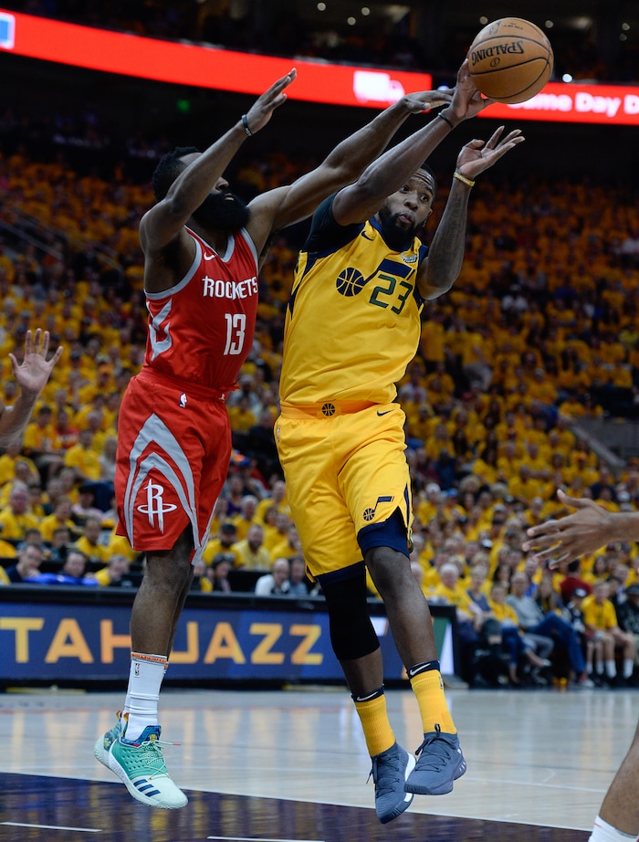 (Francisco Kjolseth | The Salt Lake Tribune) Houston Rockets guard James Harden (13) pressures Utah Jazz forward Royce O'Neale (23) in Game 4 of the NBA playoffs at the Vivint Smart Home Arena Sunday, May 6, 2018 in Salt Lake City.