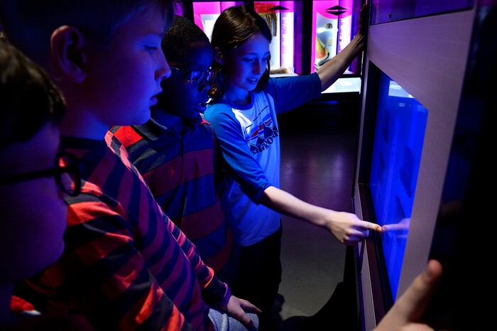 (Scott Sommerdorf | The Salt Lake Tribune) Students from Emerson Elementary School interact with an exhibit at the Utah Museum of Natural History, Wednesday, Feb., 7, 2018. "Nature's Ultimate Machines" is the UMNH special exhibition exploring the workings of plants and animals and how they rely on finely-tuned natural devices to move, adapt and survive.