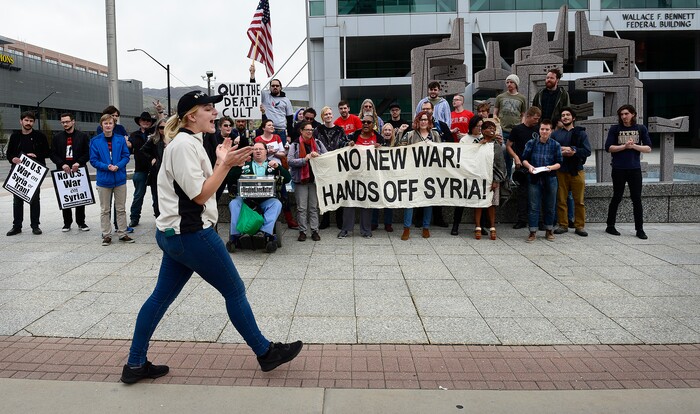 (Scott Sommerdorf | The Salt Lake Tribune)
A group of about 40 people protested the strikes on Syria, Sunday, April 15, 2018.