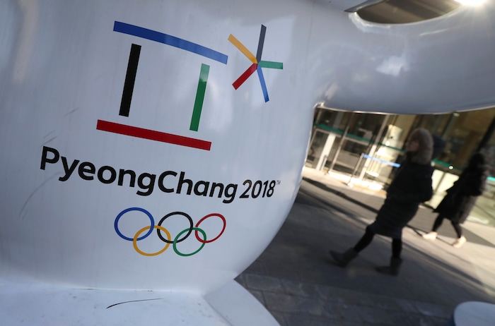 The official emblem of the 2018 Pyeongchang Games is seen in downtown Seoul, South Korea, Thursday, Feb. 1, 2018. In a rare sight, North Korean flags flew in South Korea on Thursday as the South prepared for the Winter Olympics that has brought a temporary lull in tensions surrounding the North's nuclear program. (AP Photo/Lee Jin-man)