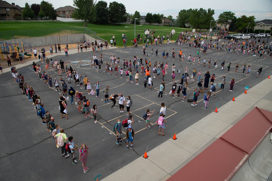 (Francisco Kjolseth  |  The Salt Lake Tribune) Students at Canyon View Elementary in Cottonwood Heights line up on the playground as they go back to school for the first day of classes for the Canyons School District on Monday, August 24, 2020, with parents asked to stay back on the playground lawn while they wait for first bell.