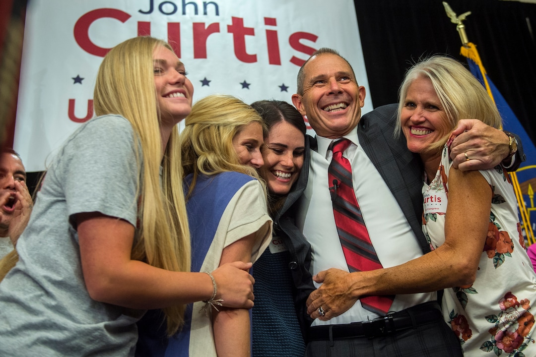 (Chris Detrick  |  The Salt Lake Tribune)  Provo Mayor John Curtis celebrates with his wife Sue and daughters Nicole, Kierston and Sarah Jane during his election night party at the Provo Marriott Hotel & Conference Center Tuesday, August 15, 2017. 