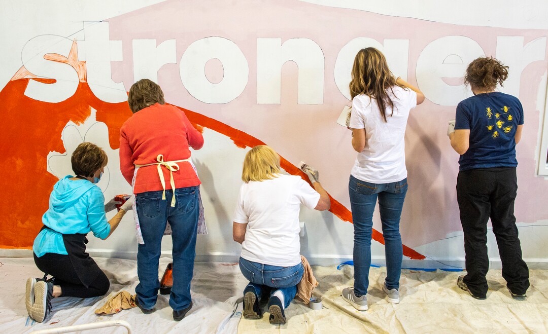 (Rick Egan | The Salt Lake Tribune) ​First Lady Abby Cox and legislative spouses and partners work on a mural art the  Utah YWCA, during a day of service. According to the media advisory, the project marks the first public-facing event hosted by the First Lady, and involves painting of two pre-traced murals located in common areas utilized by YWCA shelter and housing residents. The murals reflect the YWCA’s mission of eliminating racism and empowering women. Tuesday, March 2, 2021.