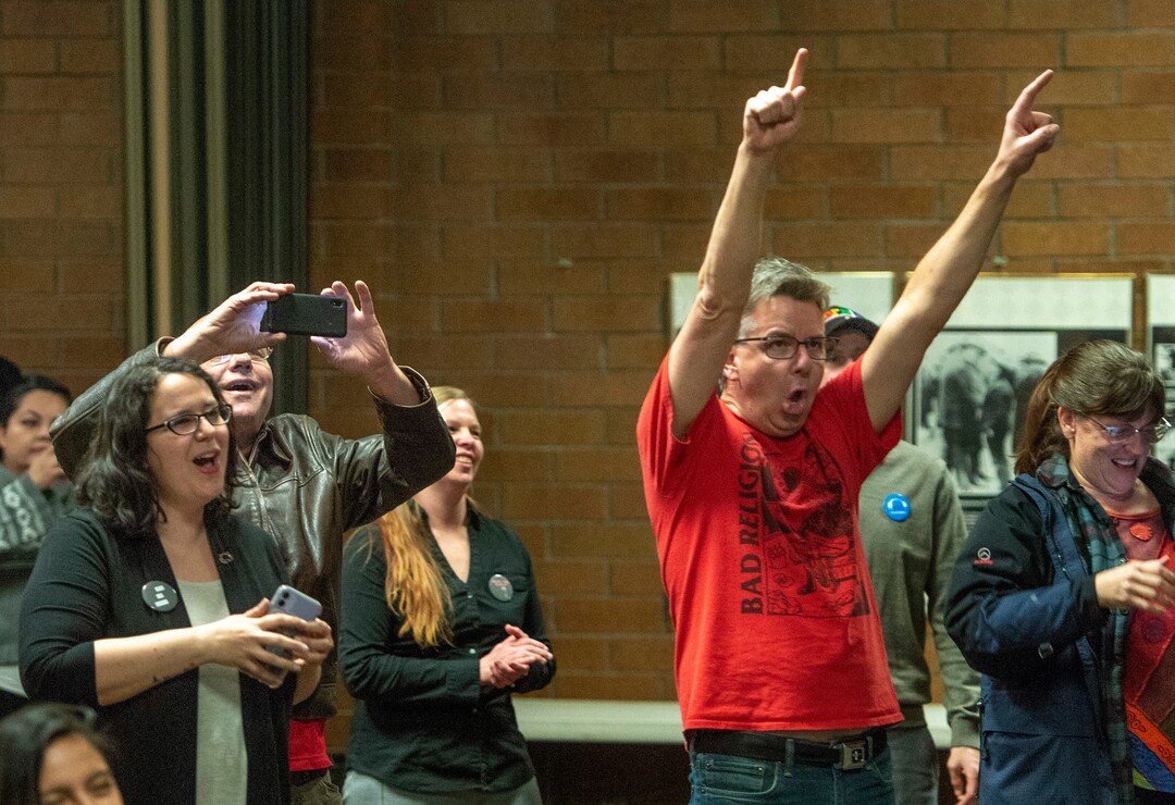 (Rick Egan  |  The Salt Lake Tribune)  Bernie Sanders supporters cheer as the watch the returns come in at an election watch party at the Teamsters & Chauffeurs Union in West Valley, on Super Tuesday March 3, 2020