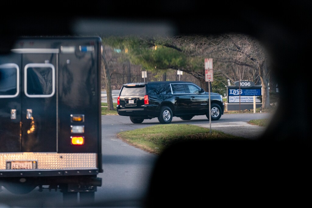 (Carolyn Kaster | The Associated Press) A motorcade with President-elect Joe Biden aboard arrives at Delaware Orthopaedic Specialists to see a doctor, Sunday, Nov. 29, 2020, in Newark, Del. Biden slipped while playing with his dog Major, and twisted his ankle.
