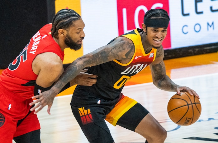 (Rick Egan | The Salt Lake Tribune) Utah Jazz guard Jordan Clarkson (00) is guarded by Toronto Raptors guard DeAndre' Bembry (95) and Toronto Raptors forward Pascal Siakam (43), in NBA action between the Utah Jazz and the Toronto Raptors at Vivint Arena, on Saturday, May 1, 2021.