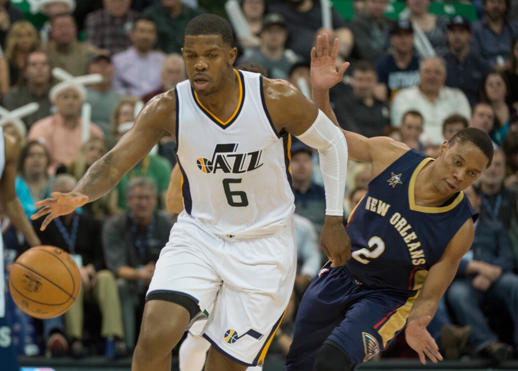 (Rick Egan | The Salt Lake Tribune) Utah Jazz forward Joe Johnson (6) gets past New Orleans Pelicans guard Tim Frazier (2), in NBA action Utah Jazz vs. New Orleans Pelicans, in Salt Lake City, Monday, March 27, 2017.