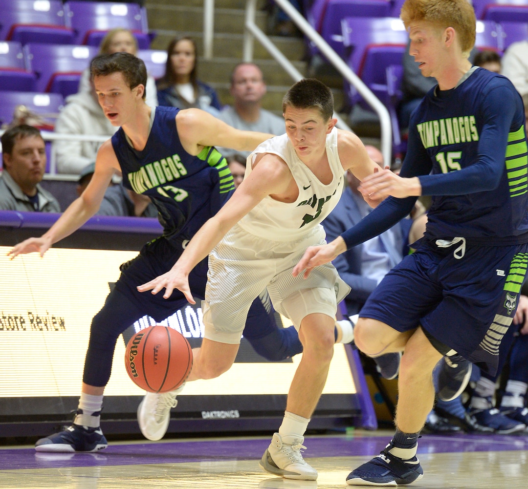 Leah Hogsten  |  The Salt Lake TribuneOlympus' Rylan Jones loses control of the ball under pressure from Timpanogos' Conner Halford and Tyler Walker. Olympus High School defeated Timpanogos High School 91-69 during their 4A State boys’ basketball quarterfinal playoff game at Weber State University's Dee Events Center, Thursday, March 2, 2017.