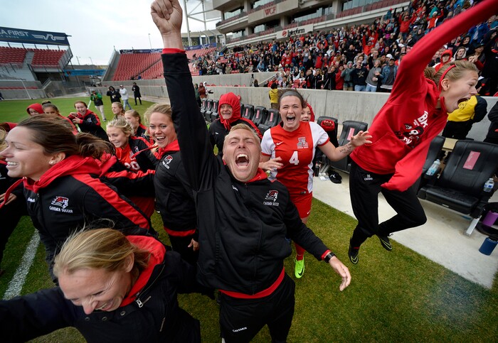 (Scott Sommerdorf   |  The Salt Lake Tribune)   American Fork Derek Dunn celebrates with his team as the Cavemen beat Syracuse 3-1 to win the 6A championship game played at Rio Tinto, Friday, October 20, 2017. 