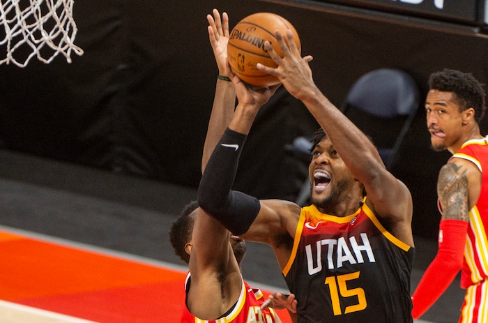(Rick Egan | The Salt Lake Tribune). Utah center Derrick Favors (15) shoots for the Jazz, in NBA action between the Utah Jazz and the Atlanta Hawks at Vivint Arena, on Friday, Jan. 15, 2021.