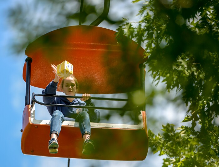 (Leah Hogsten | The Salt Lake Tribune) A student drops her egg box during the Egg drop competition at the 2018 29th Annual Utah State University Physics Day where some 9,000 high school and middle school students from Utah, Idaho, Wyoming and Nevada compete in science projects, Friday, May 18, 2018 at Lagoon Amusement Park in Farmington.