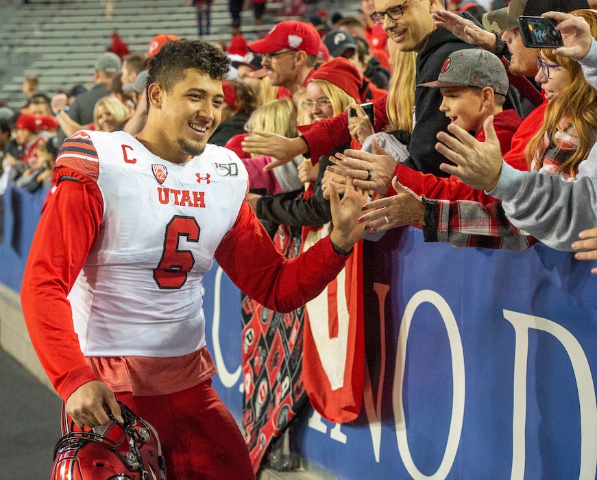 (Rick Egan  |  Tribune file photo) Utah defensive end Bradlee Anae greets fans after a 35-7 win over Arizona on Nov. 23, 2019, in Tucson, Ariz. Ute fans have traveled in significant numbers to all five road games this season.
