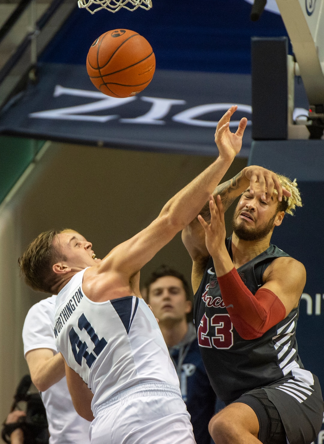 (Rick Egan  |  The Salt Lake Tribune)       Brigham Young Cougars forward Luke Worthington (41) goes for a rebound song with Santa Clara Broncos center Ezekiel Richards (23), in basketball action between Brigham Young Cougars and Santa Clara Broncos at the Marriott Center in Provo, Saturday, Jan. 12, 2019.
