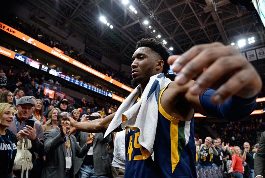 (Francisco Kjolseth  |  The Salt Lake Tribune)  Utah Jazz guard Donovan Mitchell (45) celebrates with fans the team win 128-120 as the Utah Jazz host the New Orleans Pelicans in their NBA basketball game at Vivint Smart Home Arena in Salt Lake City on Sat. Nov. 23, 2019.