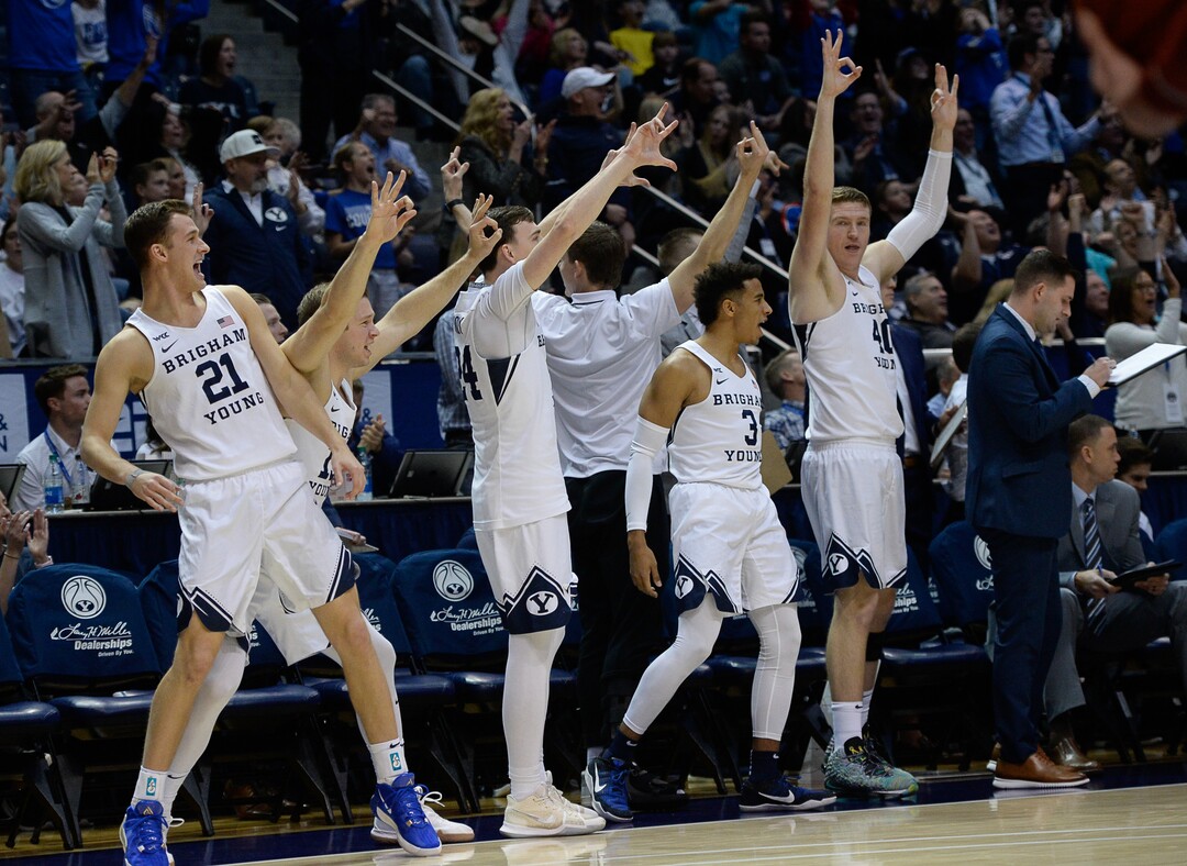 (Francisco Kjolseth  |  The Salt Lake Tribune) The BYU bench erupts following a shot by Brigham Young Cougars forward Yoeli Childs (23) in the second half as the Brigham Young Cougars host the Santa Clara Broncos at the Marriott Center in Provo, Thursday, Feb. 20, 2020. BYU won 85-75.
