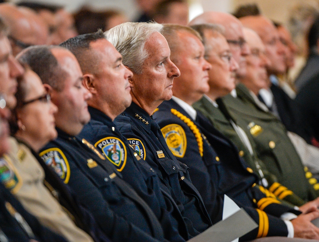 Leah Hogsten  |  The Salt Lake Tribune   Utah law enforcement officers listen to U.S. Attorney General Jeff Sessions as he talks about the success of Project Safe Neighborhoods in Utah during a U. S. Attorney General Law Enforcement Commemoration, October 3, 2018, at the Capitol. Wednesday marks the one year anniversary since the Trump administration returned to the policy pushed by the George W. Bush administration. Under Project Safe Neighborhoods, federal prosecutors focus on security stiff sentences for those convicted of gun crimes and reducing violent crimes.