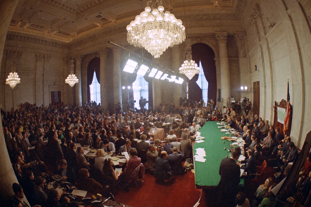 (AP file Photo) In this May 18, 1973, photo, the hearing of the Senate select committee on the Watergate case is held on Capitol Hill in Washington. In 1973, millions of Americans tuned in to what Variety called "the hottest daytime soap opera" — the Senate Watergate hearings that eventually led to President Richard Nixon's resignation. For multiple reasons, notably a transformed media landscape, there's unlikely to be a similar communal experience when the House impeachment inquiry targeting Donald Trump goes on national television starting Nov. 13, 2019.