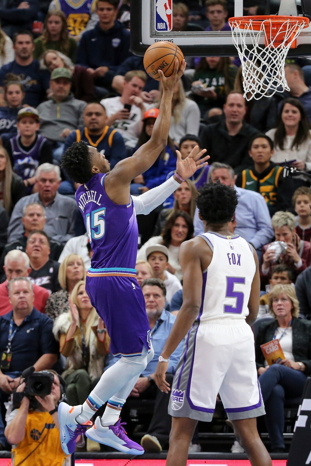 Utah Jazz guard Donovan Mitchell (45) lays the ball up during the first quarter of an NBA basketball game against the Sacramento Kings, Saturday, Oct. 26, 2019, in Salt Lake City. (AP Photo/Chris Nicoll)