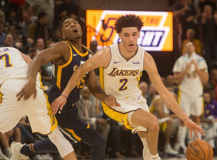 (Rick Egan  |  The Salt Lake Tribune)  Utah Jazz guard Donovan Mitchell (45) treats to get past a screen, as Los Angeles Lakers guard Lonzo Ball (2) gets past him, Saturday, October 28, 2017.