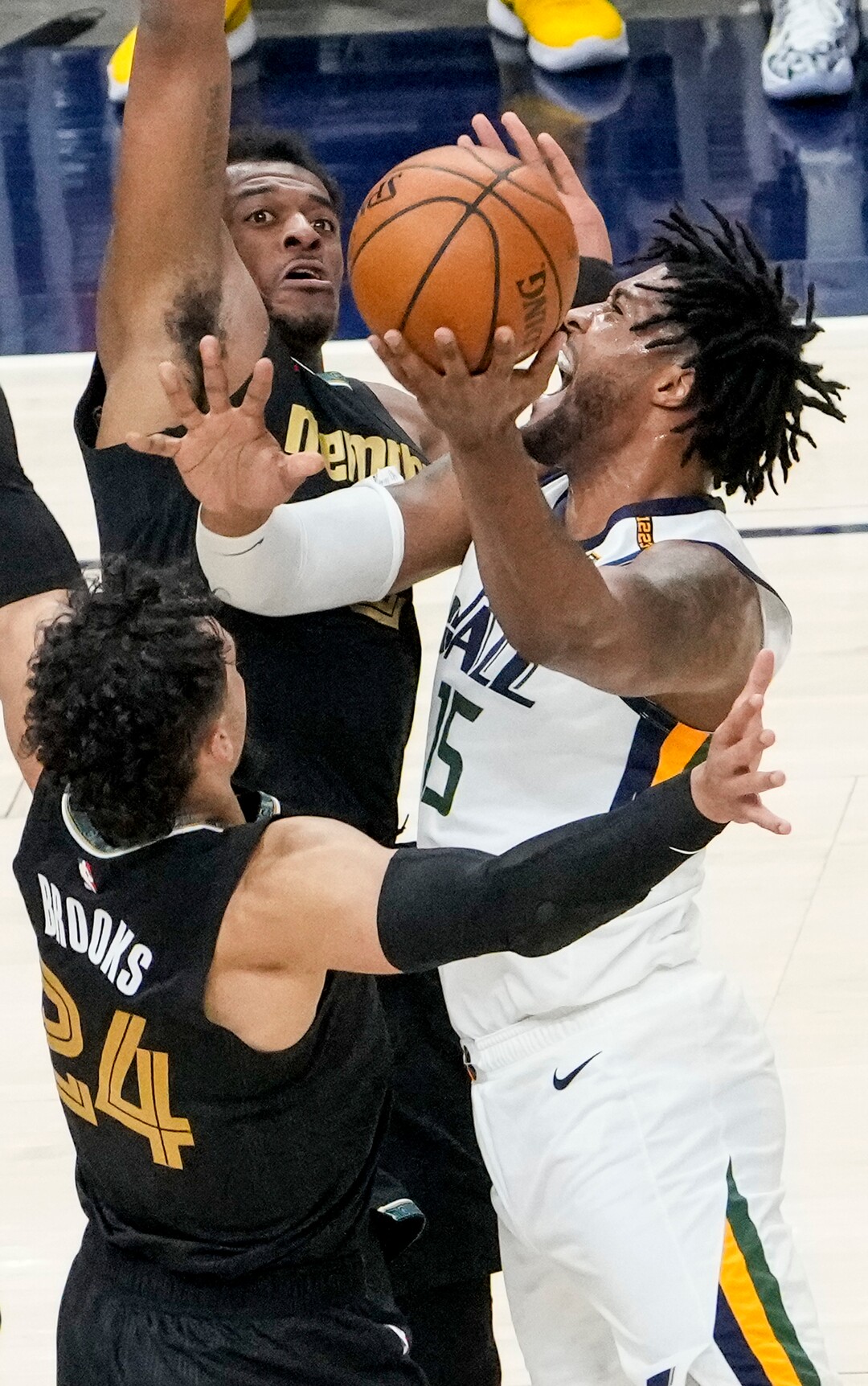 (Leah Hogsten | The Salt Lake Tribune) Utah Jazz center Derrick Favors (15) drives to the net as the Utah Jazz take on the Memphis Grizzlies during Game 1 of the first-round playoffs at Vivint Arena, May 23, 2021.