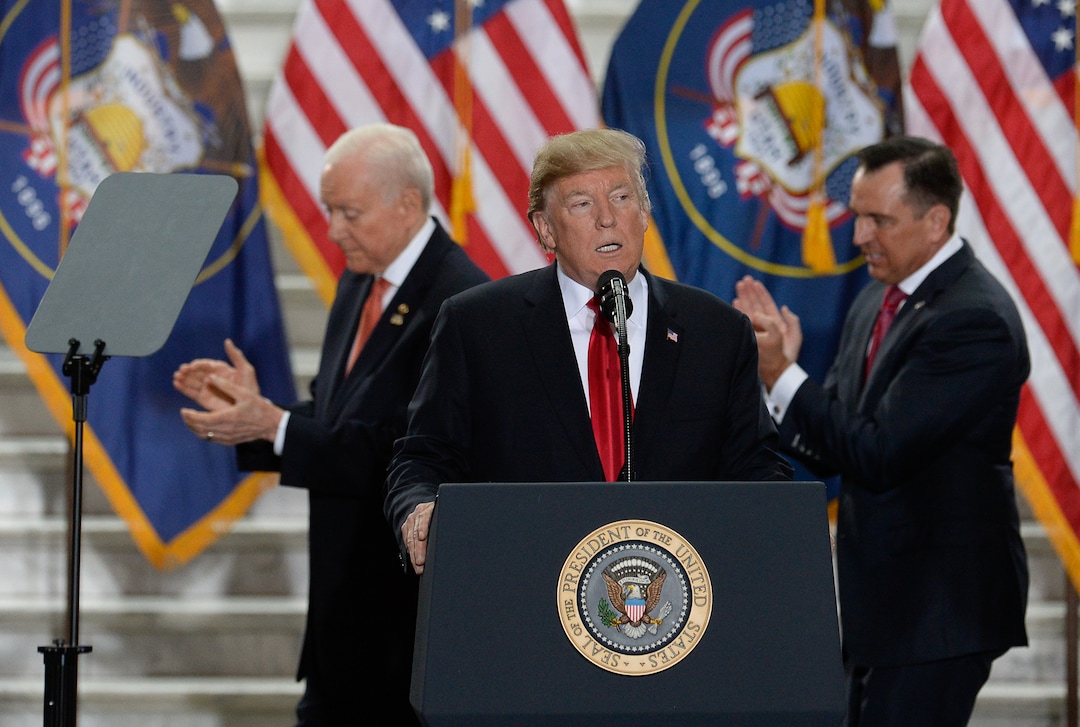 (Francisco Kjolseth  |  The Salt Lake Tribune)  Sen. Orrin Hatch, left, and Speaker of the House Greg Hughes, join U.S. President Donald Trump at the Utah Capitol on Monday, Dec. 4, 2017, moments before signing a presidential proclamation to shrink Bears Ears and Grand Staircase-Escalante national monuments.