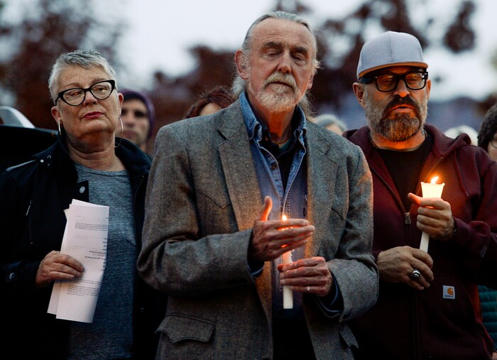 Leah Hogsten | The Salt Lake Tribune Vaughn Lovejoy, center, joins fellow community members outside Chabad Lubavitch of Utah as members of Utah's Jewish and interfaith communities hold a vigil and prayer service, Monday, Oct. 29, 2018 for the 11 people killed at the Tree of Life Synagogue in Pittsburgh.