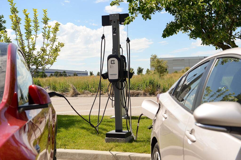 (Chris Samuels | The Salt Lake Tribune) Electric vehicle charging stations in the parking lot of Packsize, in Salt Lake City, Wednesday, July 6, 2022.