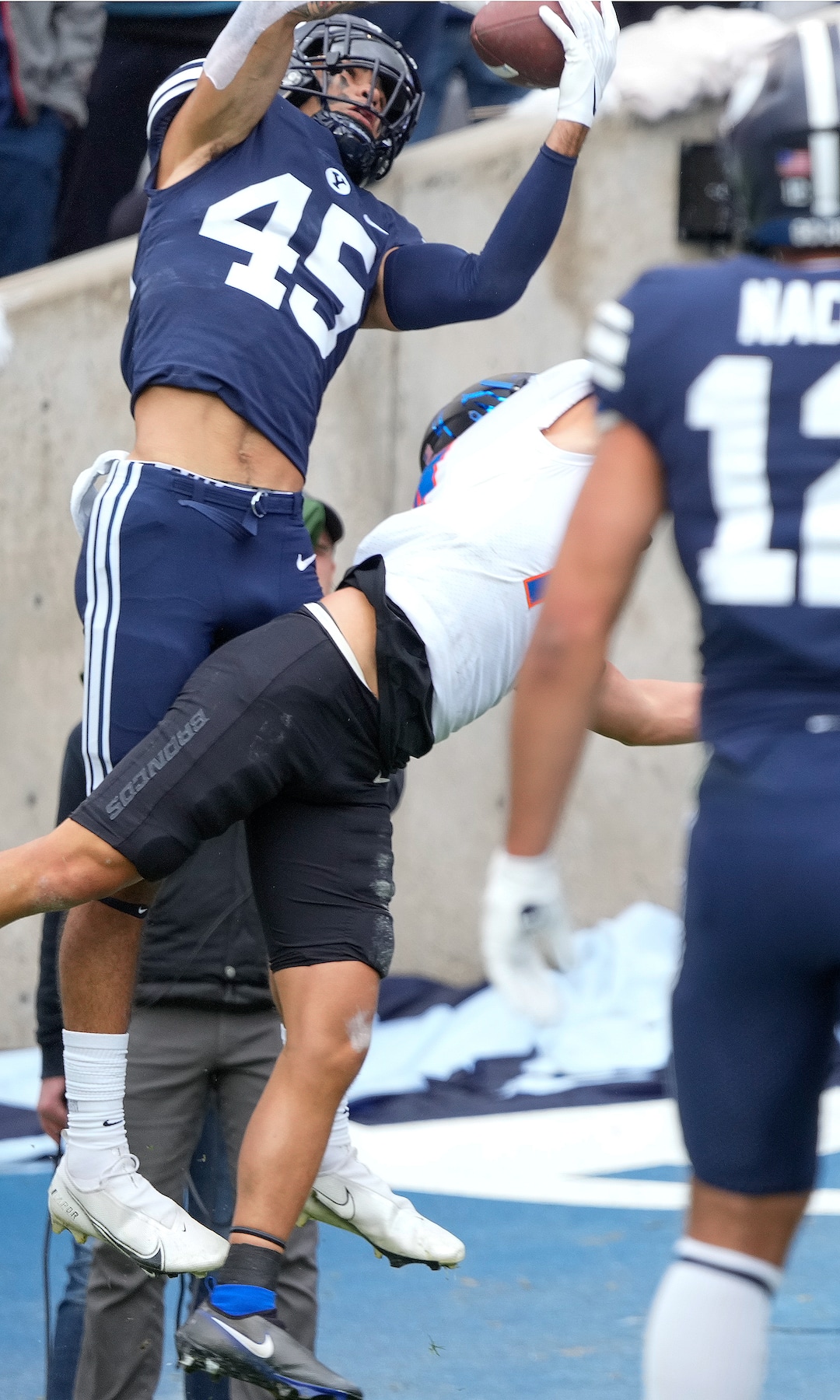 (Leah Hogsten | The Salt Lake Tribune) Brigham Young Cougars wide receiver Samson Nacua (45) grabs the pass for a touchdown over the defense of Boise State Broncos cornerback Kaonohi Kaniho (14) as No. 10 Brigham Young University hosts Boise State at LaVell Edwards Stadium, Oct. 9, 2021.