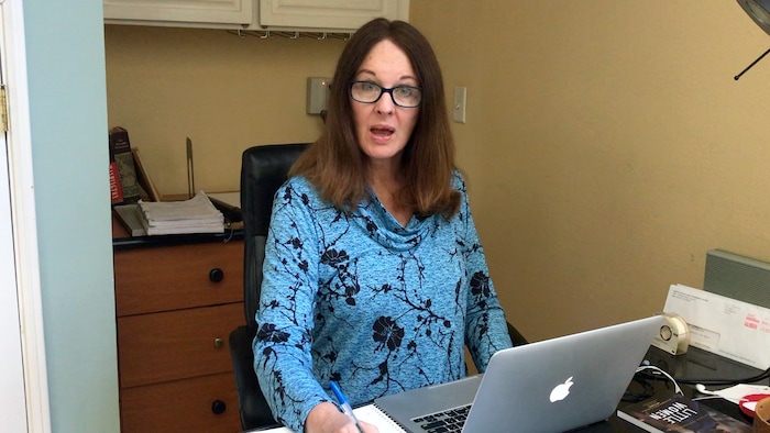 (Ron West | courtesy photo) A woman (Catherine Butterfield) goes through the process of getting federal relief money in "You and Your PPP," directed by Ron West and Butterfield, one of the short films in The Salt Lake Tribune's Quarantine Film Festival.