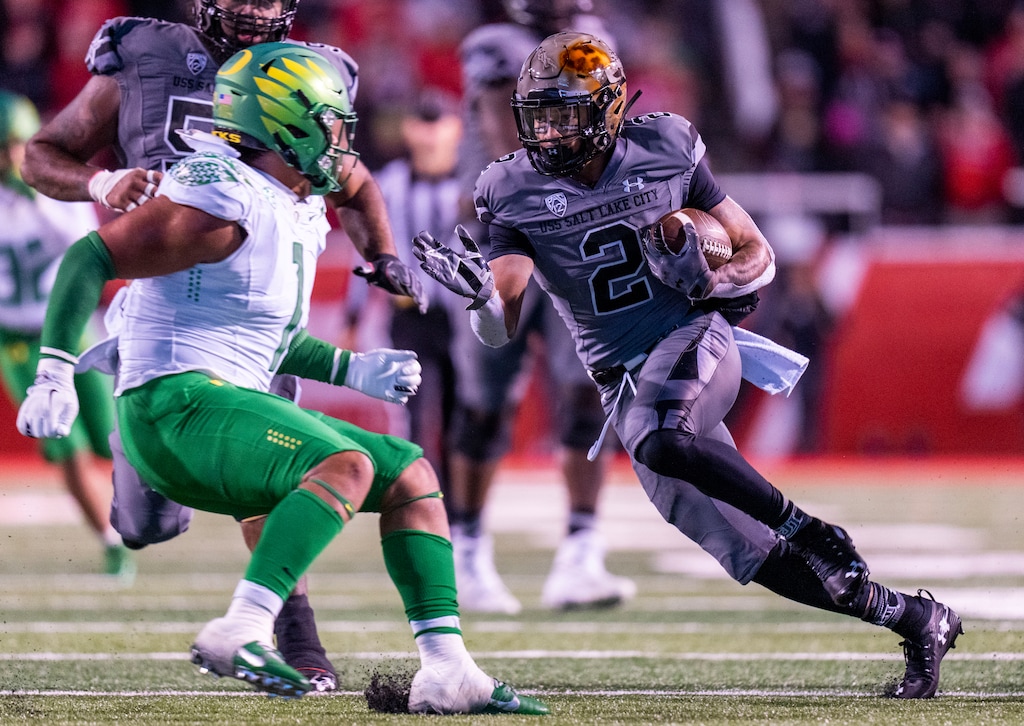 (Rick Egan | The Salt Lake Tribune) Utah running back Micah Bernard (2) runs the ball for the Utes, in PAC-12 action between the Utah Utes and the Oregon Ducks. At Rice-Eccles Stadium in Salt Lake City, on Saturday, Nov. 20, 2021.
