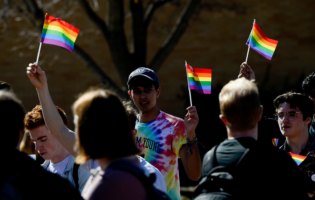 (Francisco Kjolseth | The Salt Lake Tribune) Students protest outside the student center at Brigham Young University in Provo, Wednesday, March 4, 2020, after an official with The Church of Jesus Christ of Latter-day Saints issued a clarification to the school's Honor Code, which said that same-sex romantic behavior is still "not compatible" with the rules at BYU.